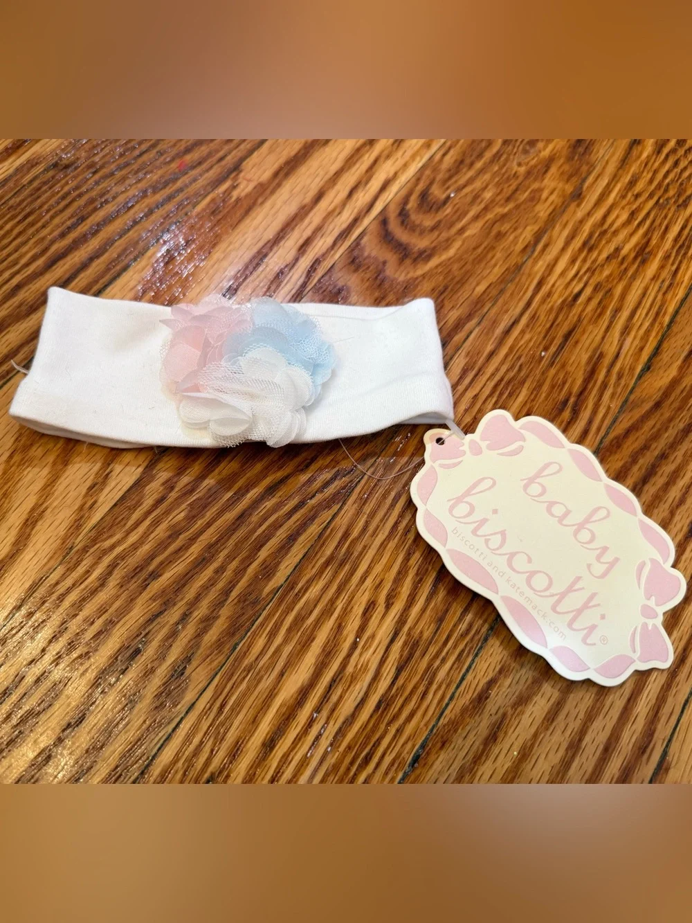 Biscotti White Baby Headband with Pastel Pink & Blue Flower